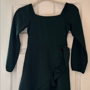 Girls lovely emerald green dress with sparkles dress. Size M.